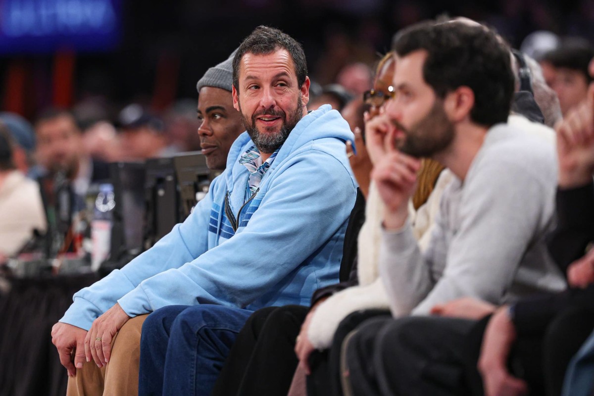 Jan 20, 2025; New York, New York, USA; Actor and comedian Adam Sandler looks on during the first half of the NBA game between the New York Knicks and the Atlanta Hawks at Madison Square Garden. Mandatory Credit: Vincent Carchietta-Imagn Images