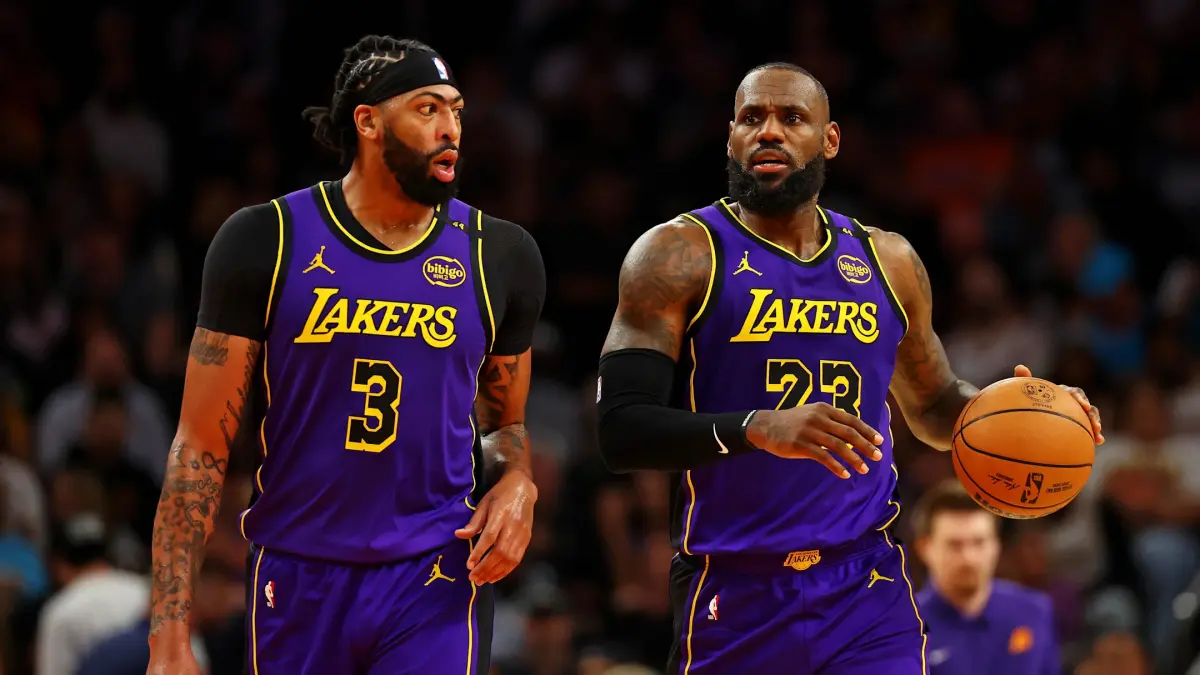 Oct 28, 2024; Phoenix, Arizona, USA; Los Angeles Lakers forward LeBron James (23) and forward Anthony Davis (3) against the Phoenix Suns at Footprint Center. Mandatory Credit: Mark J. Rebilas-Imagn Images