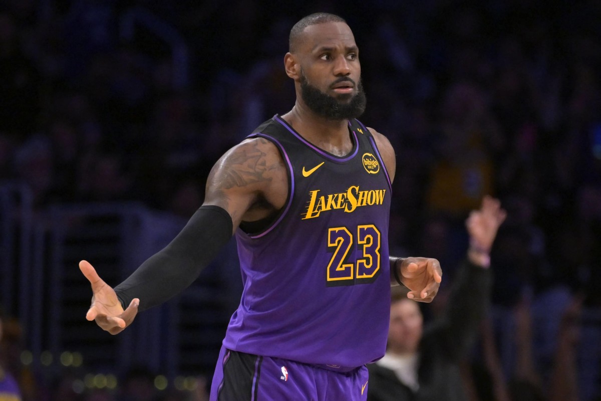 Nov 21, 2024; Los Angeles, California, USA; Los Angeles Lakers forward LeBron James (23) reacts after a 3-point basket in the second half against the Orlando Magic at Crypto.com Arena. Mandatory Credit: Jayne Kamin-Oncea-Imagn Images