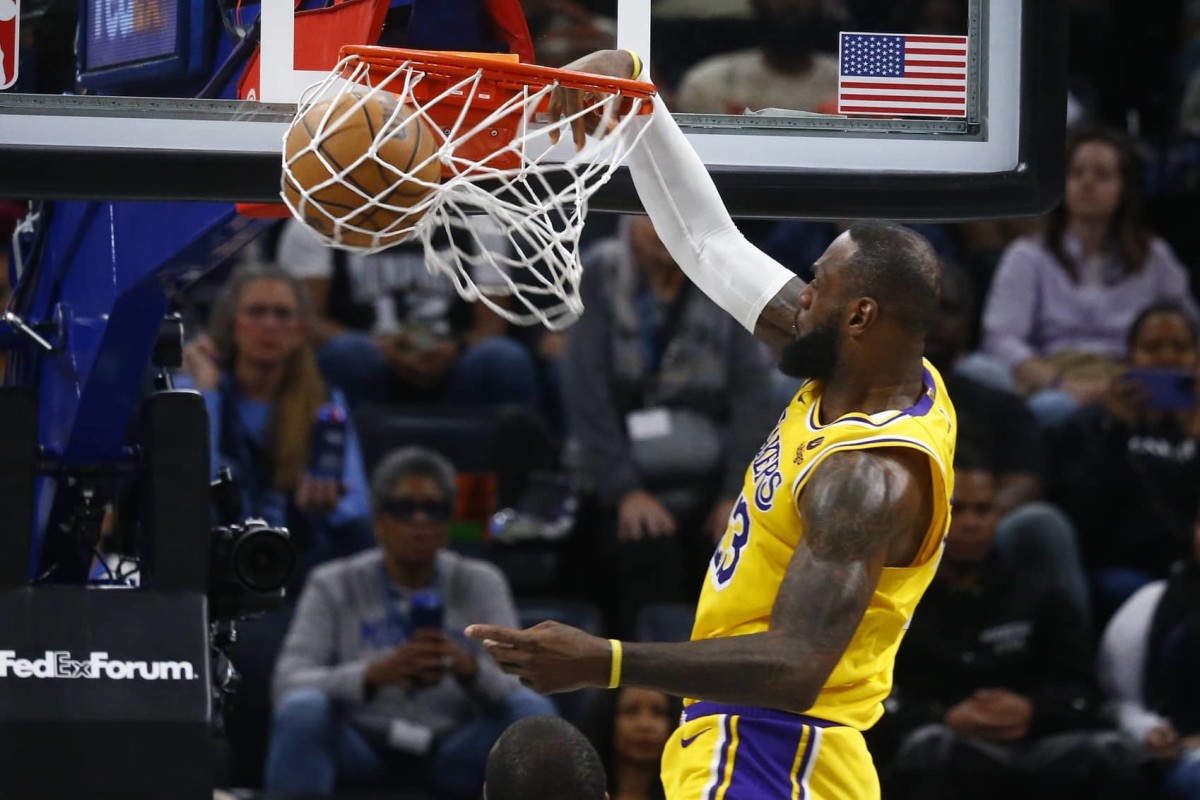 Los Angeles Lakers forward LeBron James (23) dunks during the second half against the Memphis Grizzlies at FedExForum. Mandatory Credit: Petre Thomas-Imagn Images