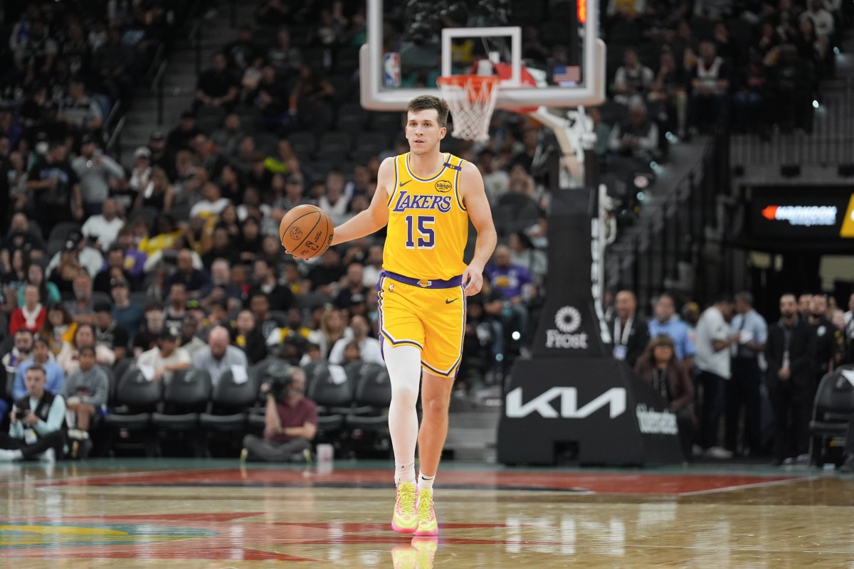 Nov 27, 2024; San Antonio, Texas, USA; Los Angeles Lakers guard Austin Reaves (15) dribbles in the second half against the San Antonio Spurs at Frost Bank Center. Mandatory Credit: Daniel Dunn-Imagn Images  