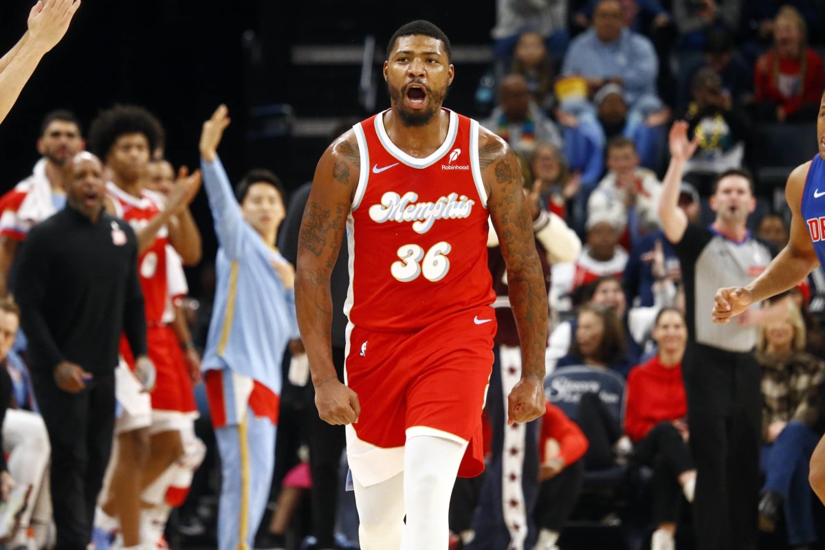 Nov 27, 2024; Memphis, Tennessee, USA; Memphis Grizzlies guard Marcus Smart (36) reacts after a three point basket during the first half against the Detroit Pistons at FedExForum.