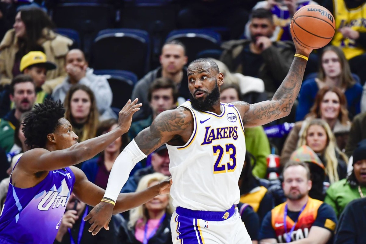 Dec 1, 2024; Salt Lake City, Utah, USA; Utah Jazz guard Collin Sexton (2) defends Los Angeles Lakers forward LeBron James (23) during the first half at the Delta Center. Mandatory Credit: Christopher Creveling-Imagn Images  