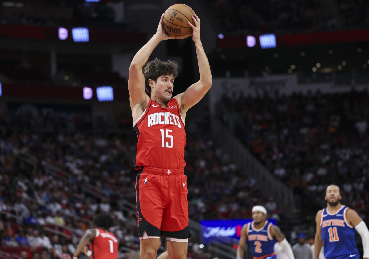 Nov 4, 2024; Houston, Texas, USA; Houston Rockets guard Reed Sheppard (15) gets a rebound during the game against the New York Knicks at Toyota Center. 