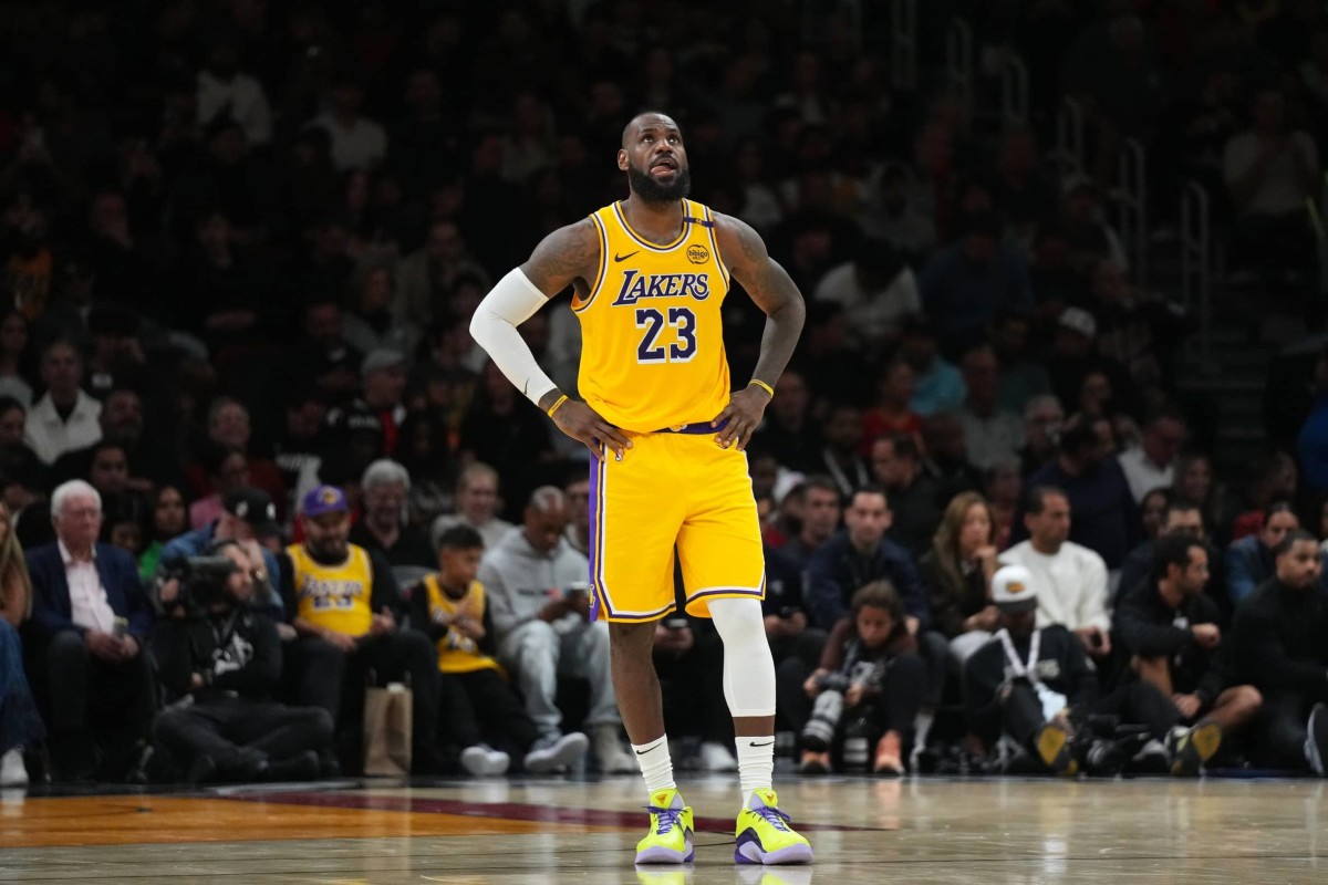 Los Angeles Lakers forward LeBron James (23) looks up at the scoreboard late in a game against the Miami Heat at Kaseya Center. Mandatory Credit: Jim Rassol-Imagn Images