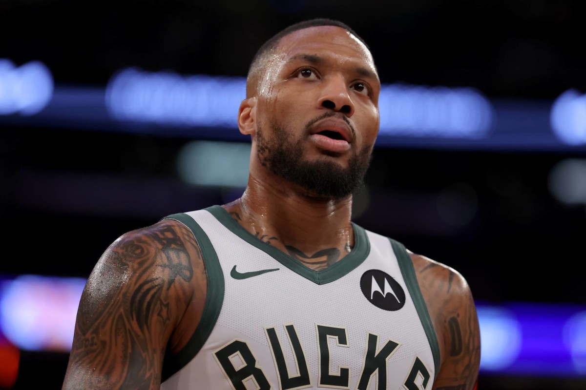 Milwaukee Bucks guard Damian Lillard (0) reacts during the second quarter against the New York Knicks at Madison Square Garden.