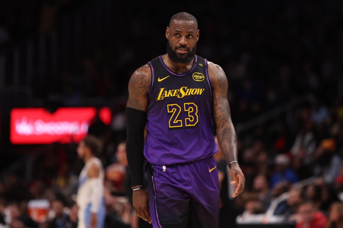 Dec 6, 2024; Atlanta, Georgia, USA; Los Angeles Lakers forward LeBron James (23) in action against the Atlanta Hawks in overtime at State Farm Arena.