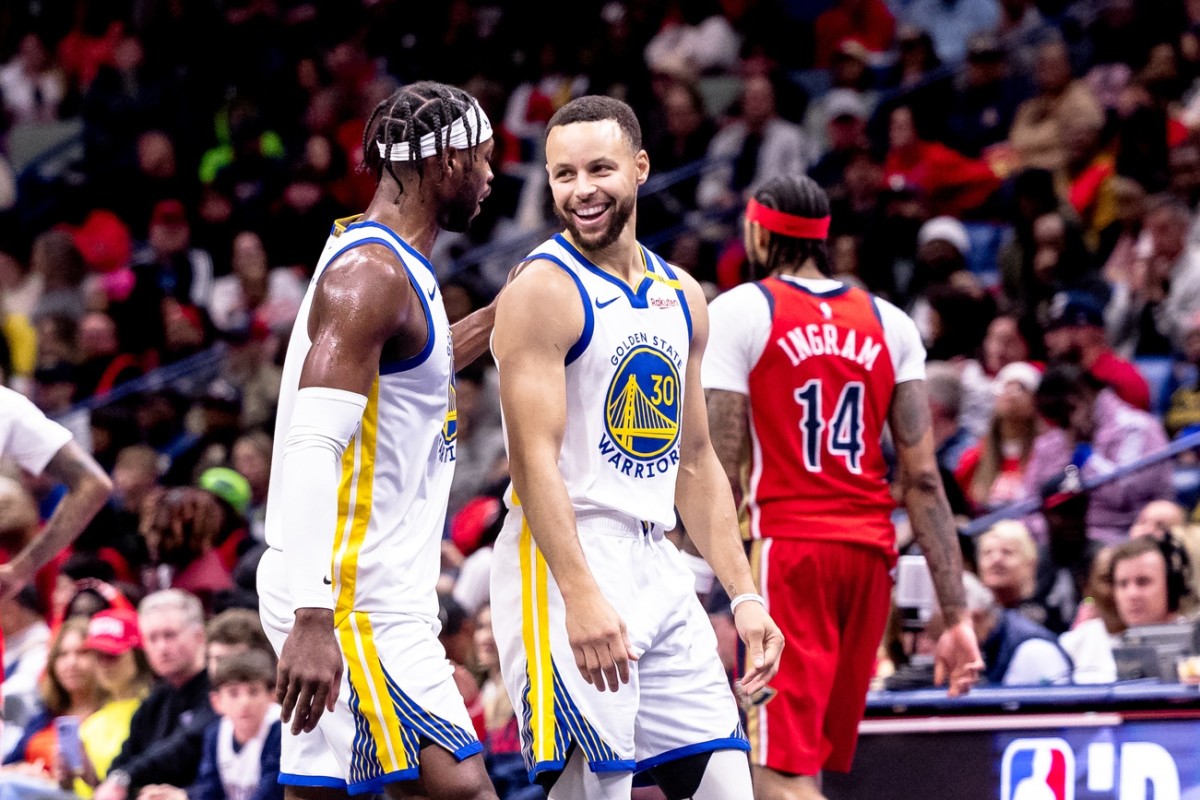 Nov 22, 2024; New Orleans, Louisiana, USA; Golden State Warriors guard Stephen Curry (30) shares a moment with guard Buddy Hield (7) on a time out against the New Orleans Pelicans during second half at Smoothie King Center. Mandatory Credit: Stephen Lew-Imagn Images