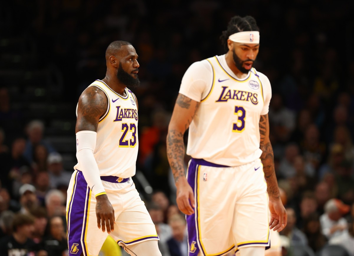 Nov 26, 2024; Phoenix, Arizona, USA; Los Angeles Lakers forward LeBron James (23) and forward Anthony Davis (3) against the Phoenix Suns during an NBA Cup game at Footprint Center. Mandatory Credit: Mark J. Rebilas-Imagn Images