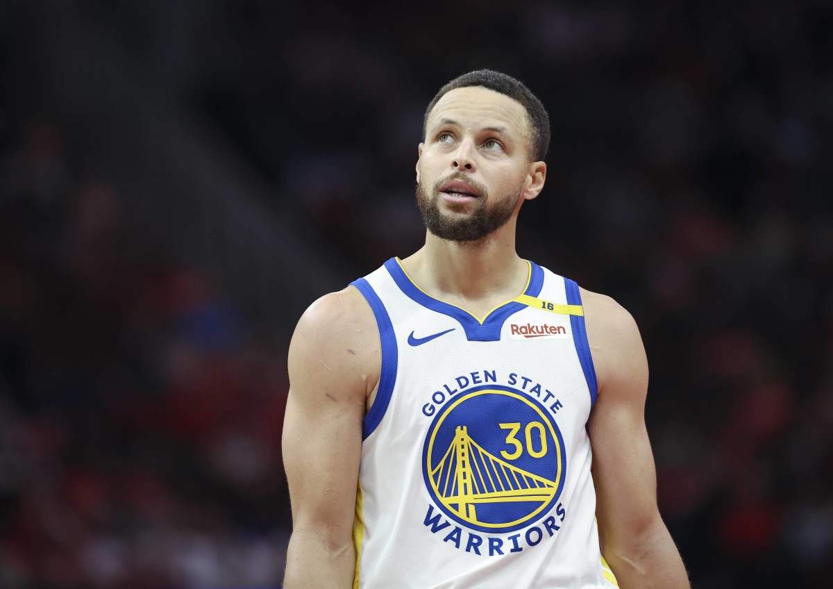 Houston, Texas, USA; Golden State Warriors guard Stephen Curry (30) looks up after a play during the fourth quarter against the Houston Rockets at Toyota Center. Mandatory Credit: Troy Taormina-Imagn Images