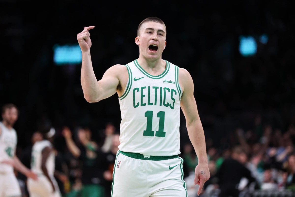 Boston Celtics guard Payton Pritchard (11) reacts during the second half against the Memphis Grizzlies at TD Garden.