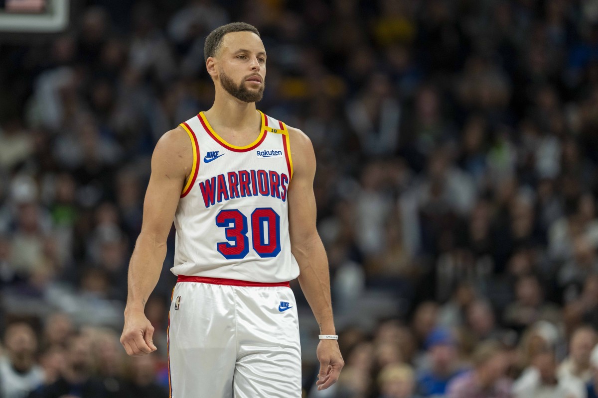 Golden State Warriors guard Stephen Curry (30) looks on against the Minnesota Timberwolves in the second half at Target Center. Mandatory Credit: Jesse Johnson-Imagn Images