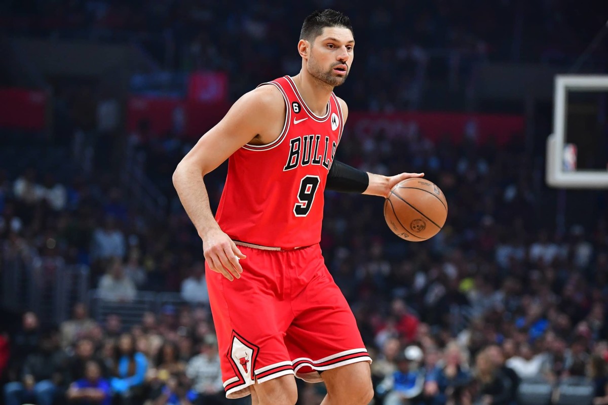 Chicago Bulls center Nikola Vucevic (9) controls the ball against the Los Angeles Clippers during the first half at Crypto.com Arena. Mandatory Credit: Gary A. Vasquez-Imagn Images