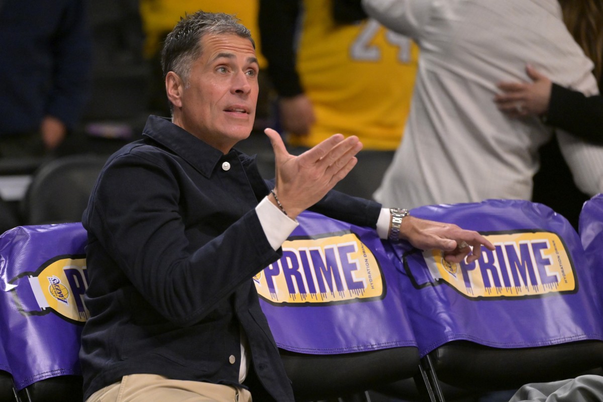 Nov 21, 2024; Los Angeles, California, USA; Los Angeles Lakers general manager Rob Pelinka looks on as players warm up prior to the game against the Orlando Magic at Crypto.com Arena. Mandatory Credit: Jayne Kamin-Oncea-Imagn Images