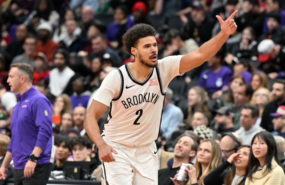 Brooklyn Nets forward Cam Johnson (2) reacts after making a three-point basket against the Toronto Raptors in the second half at Scotiabank Arena. Mandatory Credit: Dan Hamilton-Imagn Images