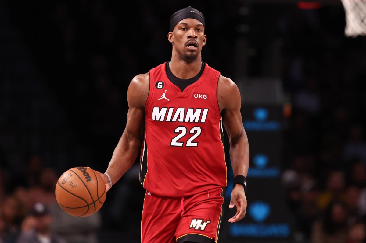 Feb 15, 2023; Brooklyn, New York, USA; Miami Heat forward Jimmy Butler (22) dribbles up court during the first half against the Brooklyn Nets at Barclays Center. Mandatory Credit: Vincent Carchietta-Imagn Images 