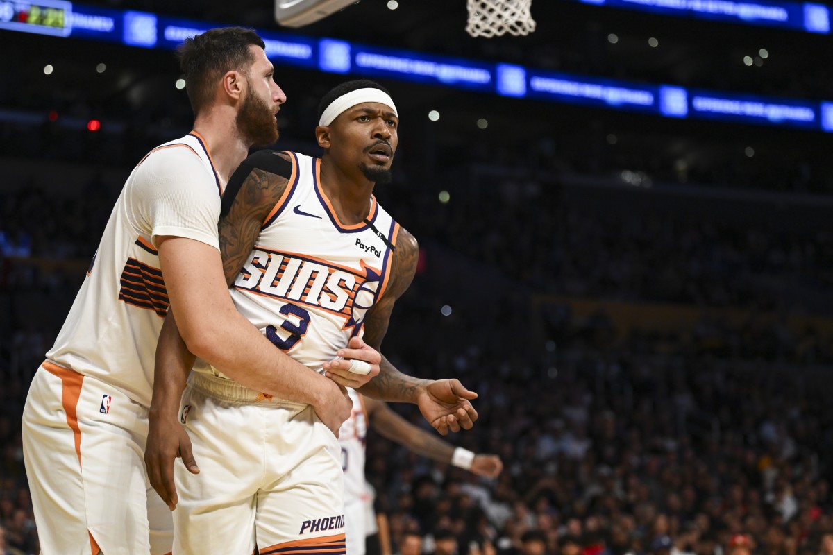 Phoenix Suns guard Bradley Beal (3) and center Jusuf Nurkic (20) react against the Los Angeles Lakers during the first half at Crypto.com Arena. Mandatory Credit: Jonathan Hui-Imagn Images