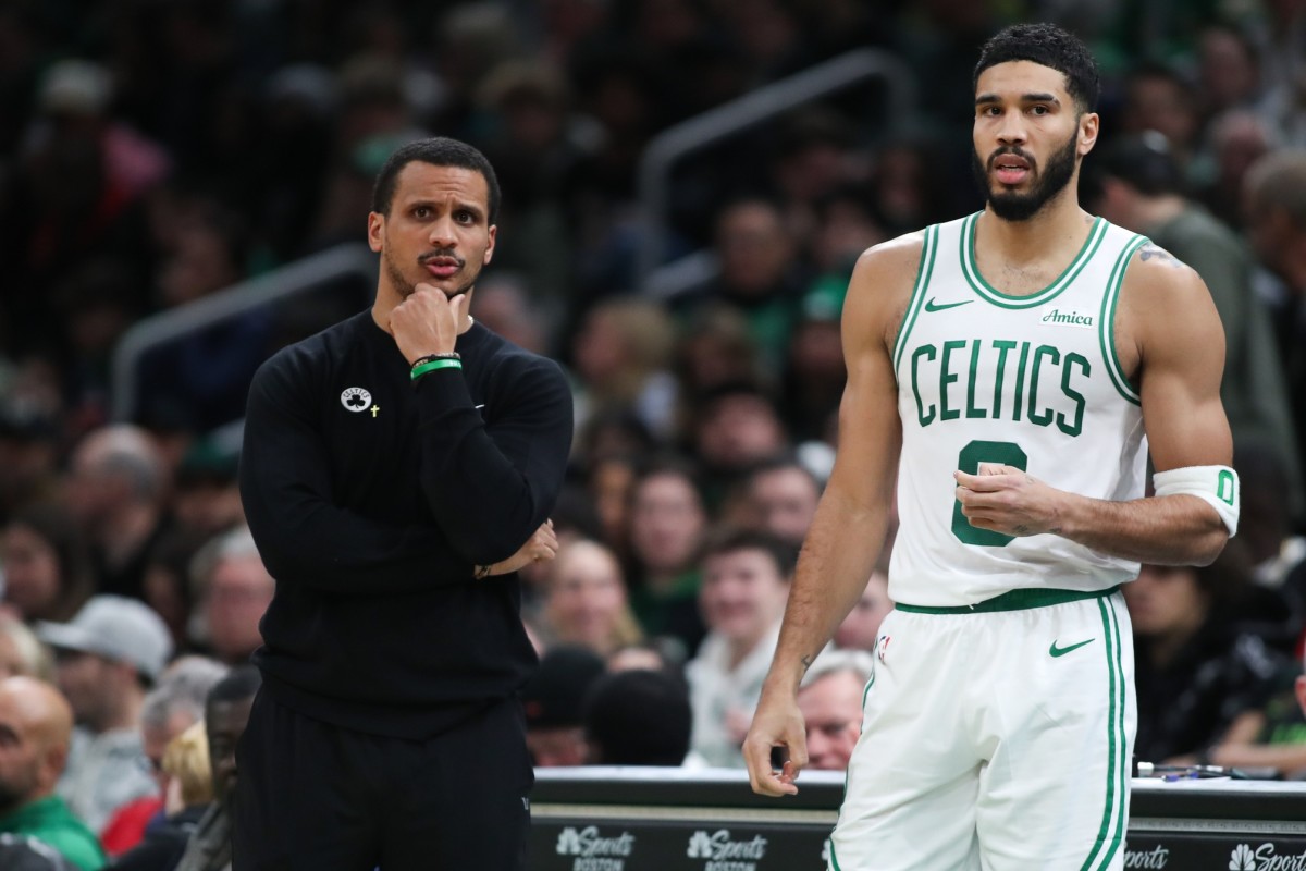 Boston Celtics head coach Joe Mazzulla and Boston Celtics forward Jayson Tatum (0) react during the first half against the Memphis Grizzlies at TD Garden. Mandatory Credit: Paul Rutherford-Imagn Images