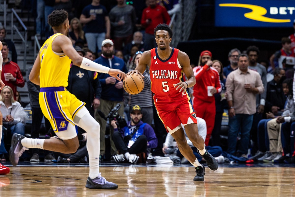 New Orleans Pelicans forward Herbert Jones (5) dribbles against the Los Angeles Lakers during the first half at Smoothie King Center. Mandatory Credit: Stephen Lew-Imagn Images