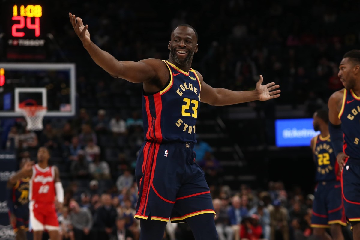 Memphis, Tennessee, USA; Golden State Warriors forward Draymond Green (23) reacts during the first quarter against the Memphis Grizzlies at FedExForum. Mandatory Credit: Petre Thomas-Imagn Images