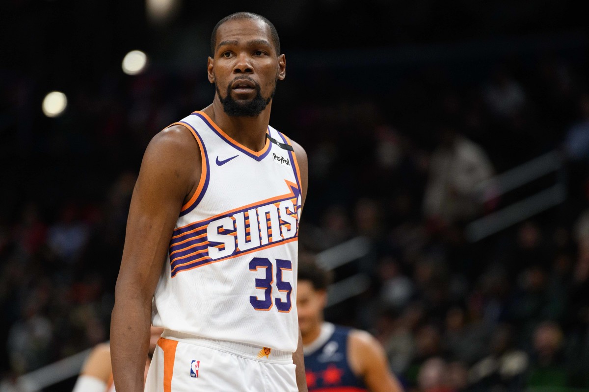 Washington, District of Columbia, USA; Phoenix Suns forward Kevin Durant (35) looks on during the first quarter against the Washington Wizards at Capital One Arena. Mandatory Credit: Reggie Hildred-Imagn Images