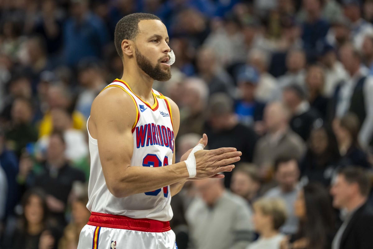 Minneapolis, Minnesota, USA; Golden State Warriors guard Stephen Curry (30) looks on against the Minnesota Timberwolves in the first half at Target Center. Mandatory Credit: Jesse Johnson-Imagn Images