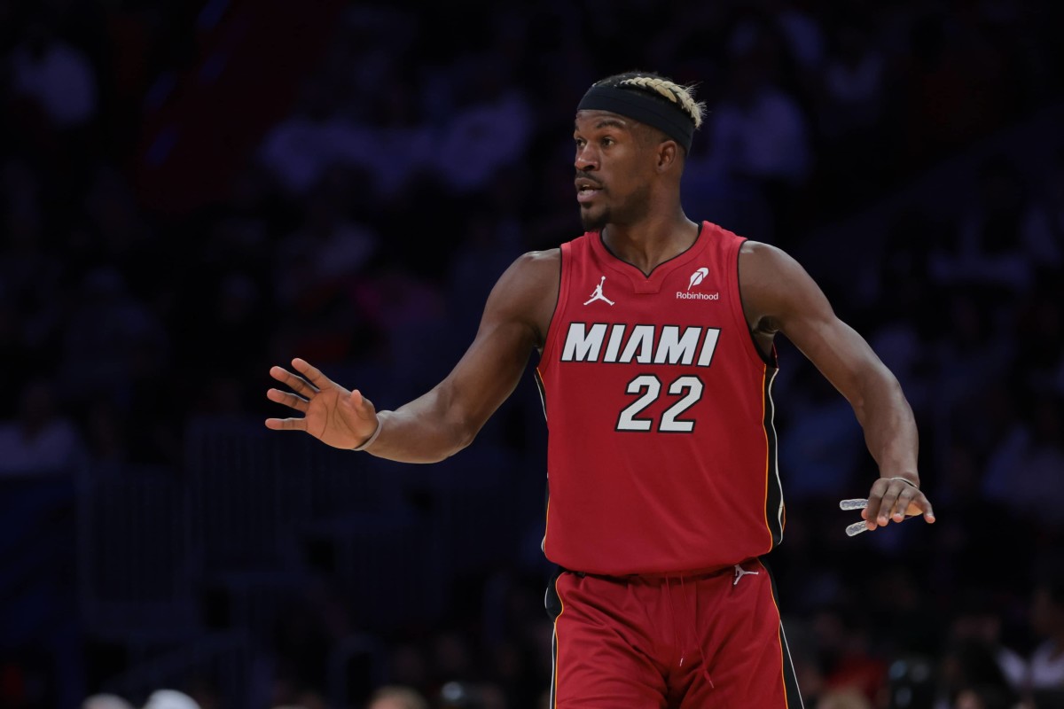 Miami, Florida, USA; Miami Heat forward Jimmy Butler (22) reacts against the Portland Trail Blazers during the third quarter at Kaseya Center. Mandatory Credit: Sam Navarro-Imagn Images