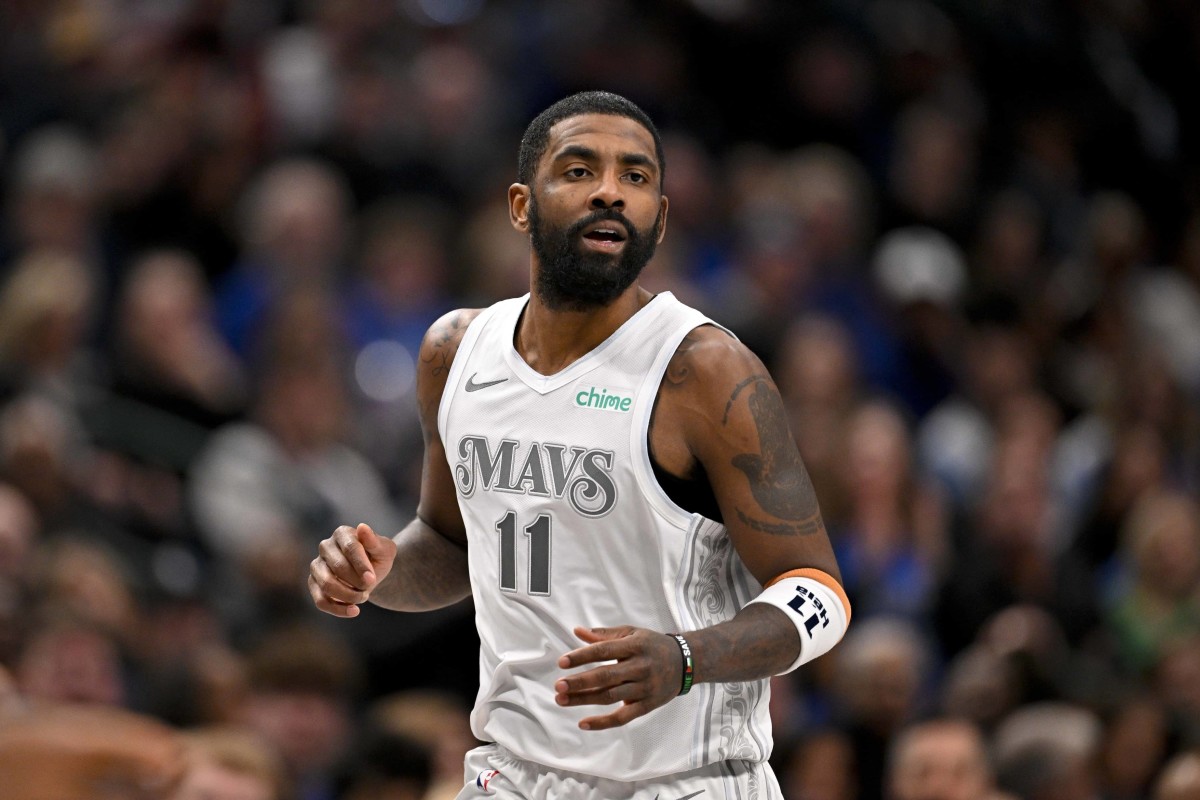 Jan 22, 2025; Dallas, Texas, USA; Dallas Mavericks guard Kyrie Irving (11) runs back up the court during the second half against the Minnesota Timberwolves at the American Airlines Center. Mandatory Credit: Jerome Miron-Imagn Images  