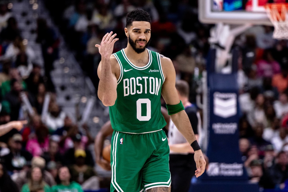 New Orleans, Louisiana, USA; Boston Celtics forward Jayson Tatum (0) reacts to making a three point basket against New Orleans Pelicans guard Brandon Boston (11) during the second half at Smoothie King Center. Mandatory Credit: Stephen Lew-Imagn Images 