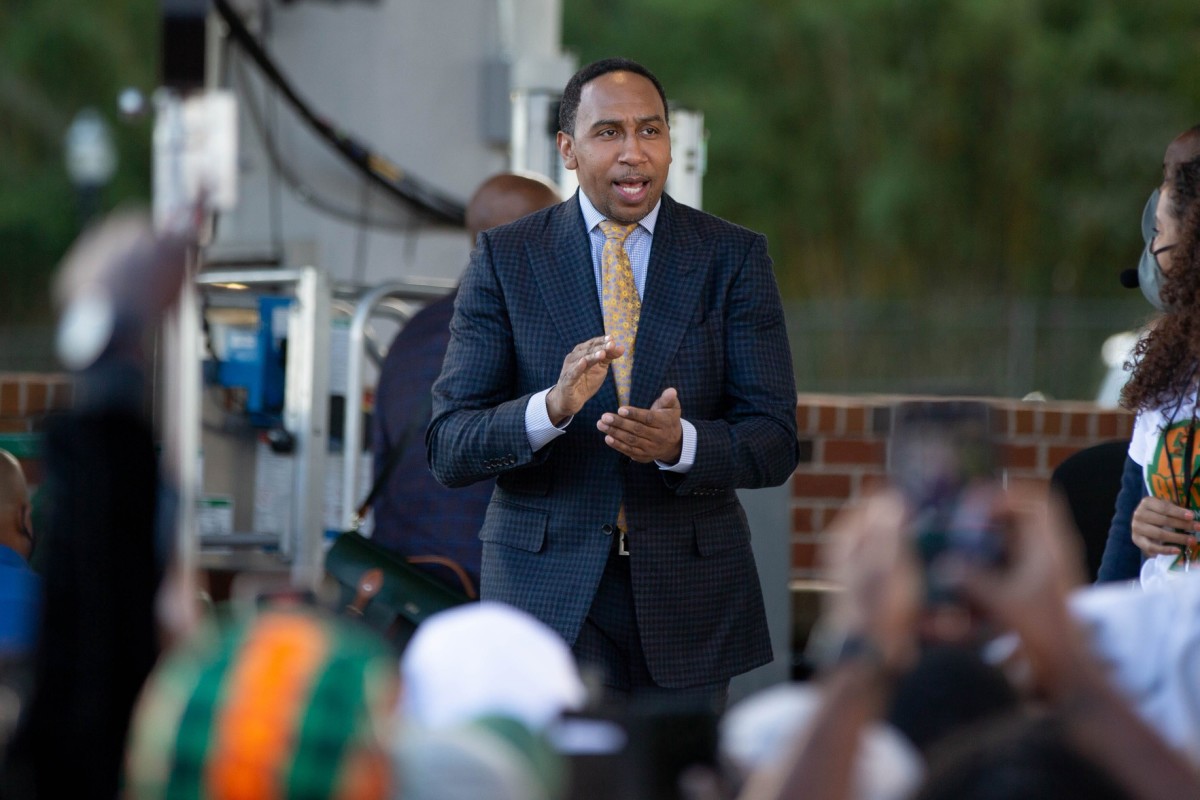 Sports commentator Stephen A. Smith is welcomed by the crowd during a live taping of ESPN's \"First Take\" at Florida A&M University's new Will Packer Performing Arts Amphitheater as part of the school's homecoming festivities