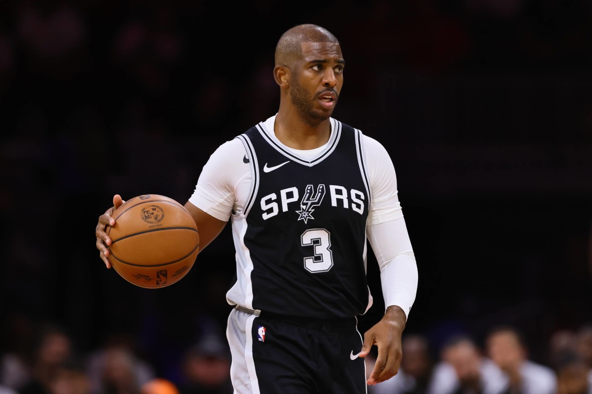 Oct 15, 2024; Miami, Florida, USA; San Antonio Spurs guard Chris Paul (3) dribbles the basketball against the Miami Heat during the first quarter at Kaseya Center. Mandatory Credit: Sam Navarro-Imagn Images