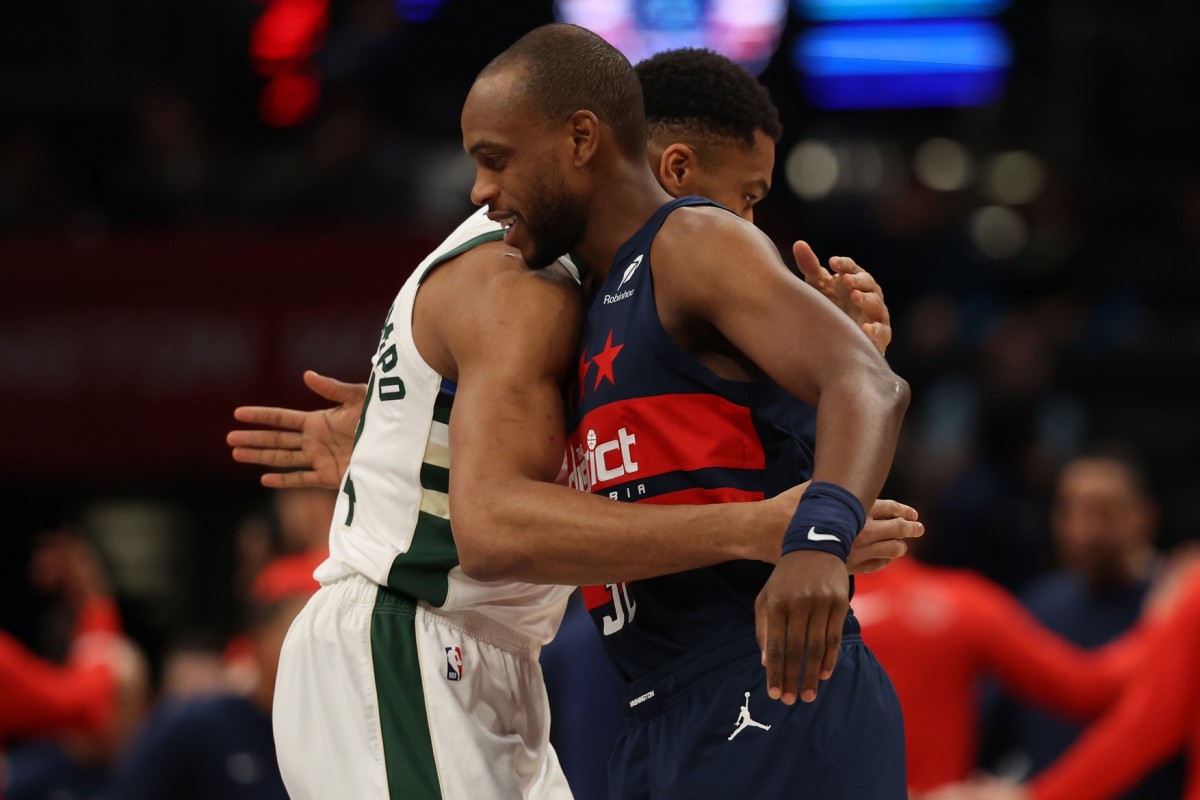Former teammates Milwaukee Bucks forward Giannis Antetokounmpo (34) and Washington Wizards forward Khris Middleton (32) hug prior to their game at Capital One Arena. Mandatory Credit: Geoff Burke-Imagn Images