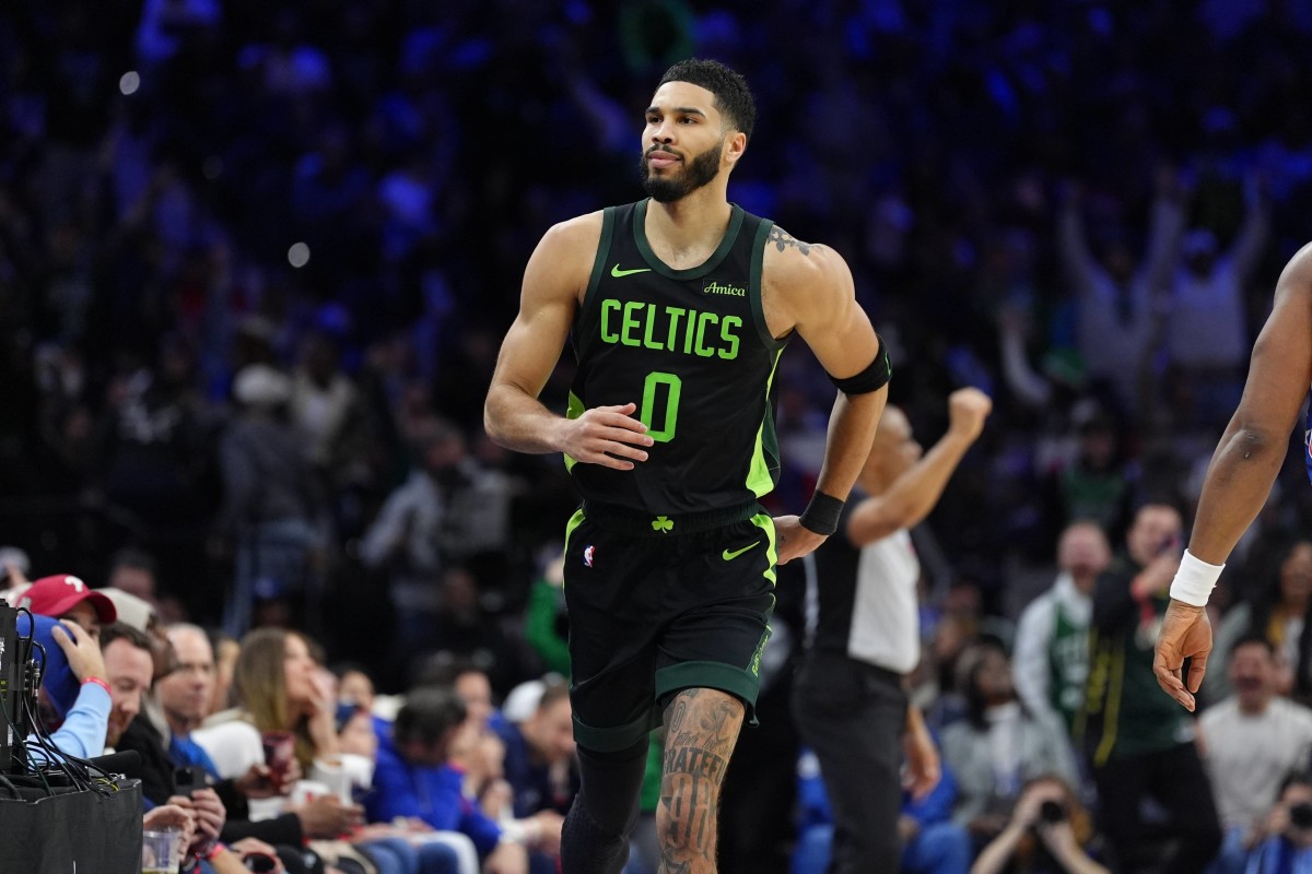 Philadelphia, Pennsylvania, USA; Boston Celtics forward Jayson Tatum (0) reacts against the Philadelphia 76ers in the fourth quarter at Wells Fargo Center. Mandatory Credit: Kyle Ross-Imagn Images