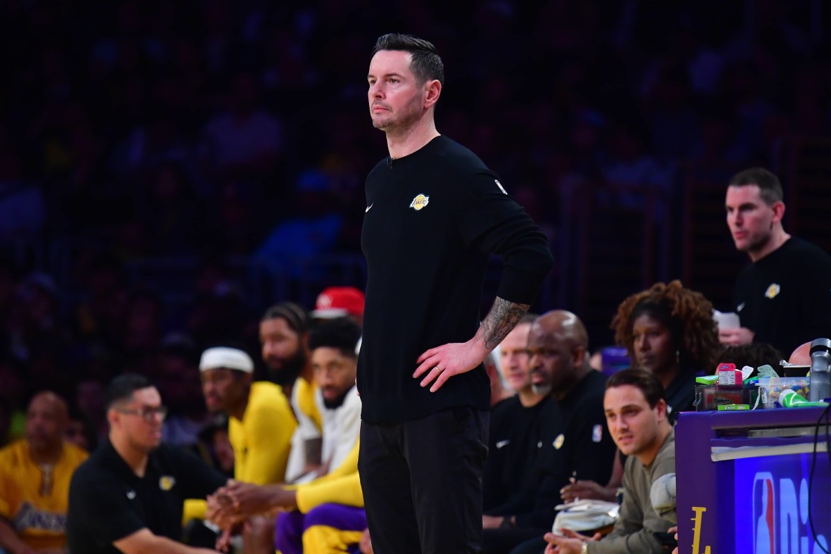 Los Angeles, California, USA; Los Angeles Lakers head coach JJ Redick watches game action against the Indiana Pacers during the second half at Crypto.com Arena. Mandatory Credit: Gary A. Vasquez-Imagn Images