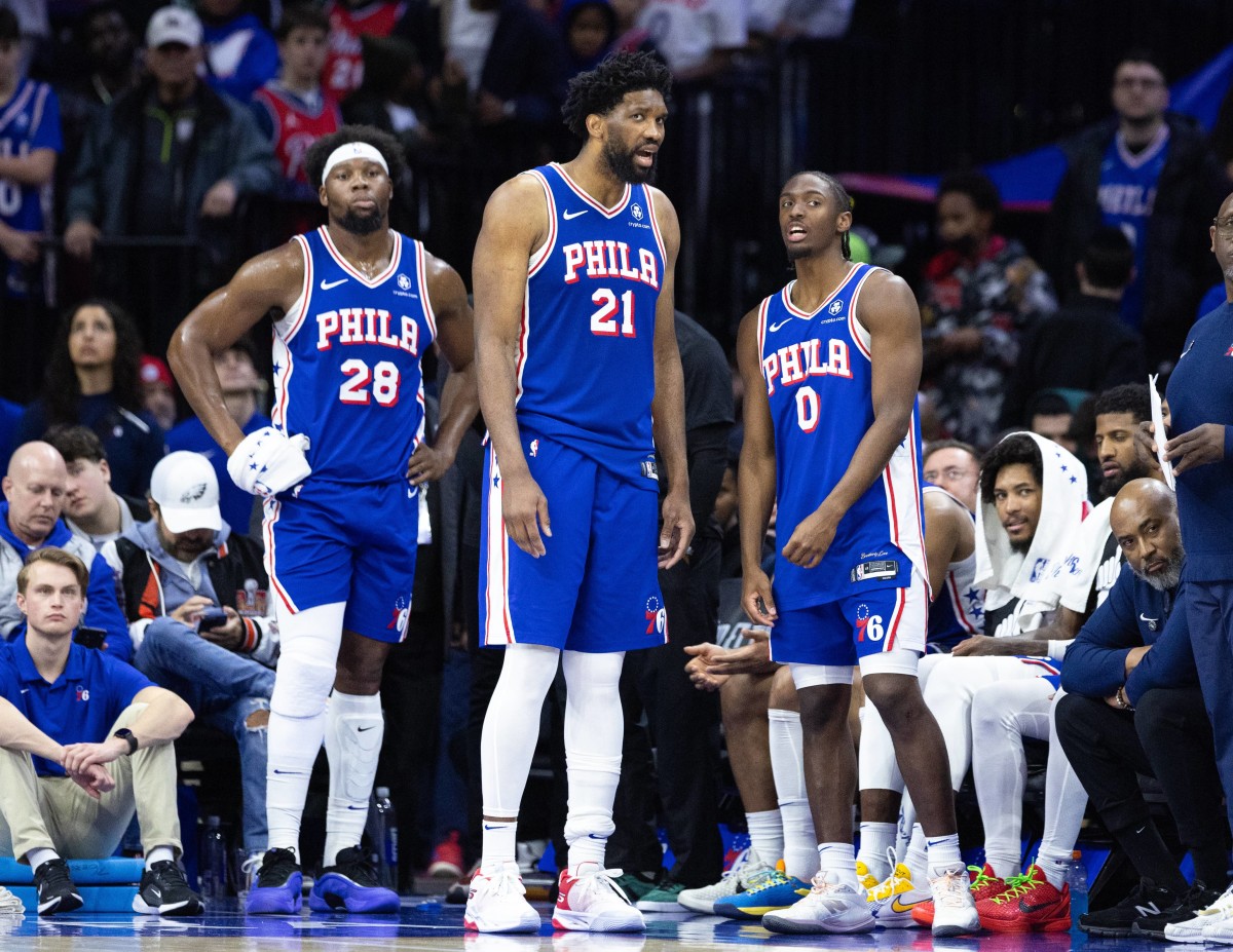 Philadelphia, Pennsylvania, USA; Philadelphia 76ers center Joel Embiid (21) and guard Tyrese Maxey (0) talk in the final minute of the fourth quarter against the Boston Celtics at Wells Fargo Center. Mandatory Credit: Bill Streicher-Imagn Images