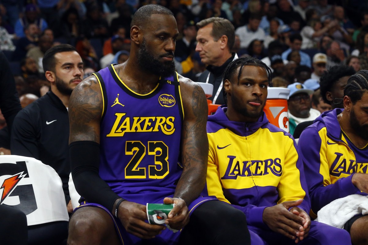  Los Angeles Lakers forward LeBron James (23) and Los Angeles Lakers guard Bronny James (9) sit on the bench during the first half against the Memphis Grizzlies at FedExForum. Mandatory Credit: Petre Thomas-Imagn Images