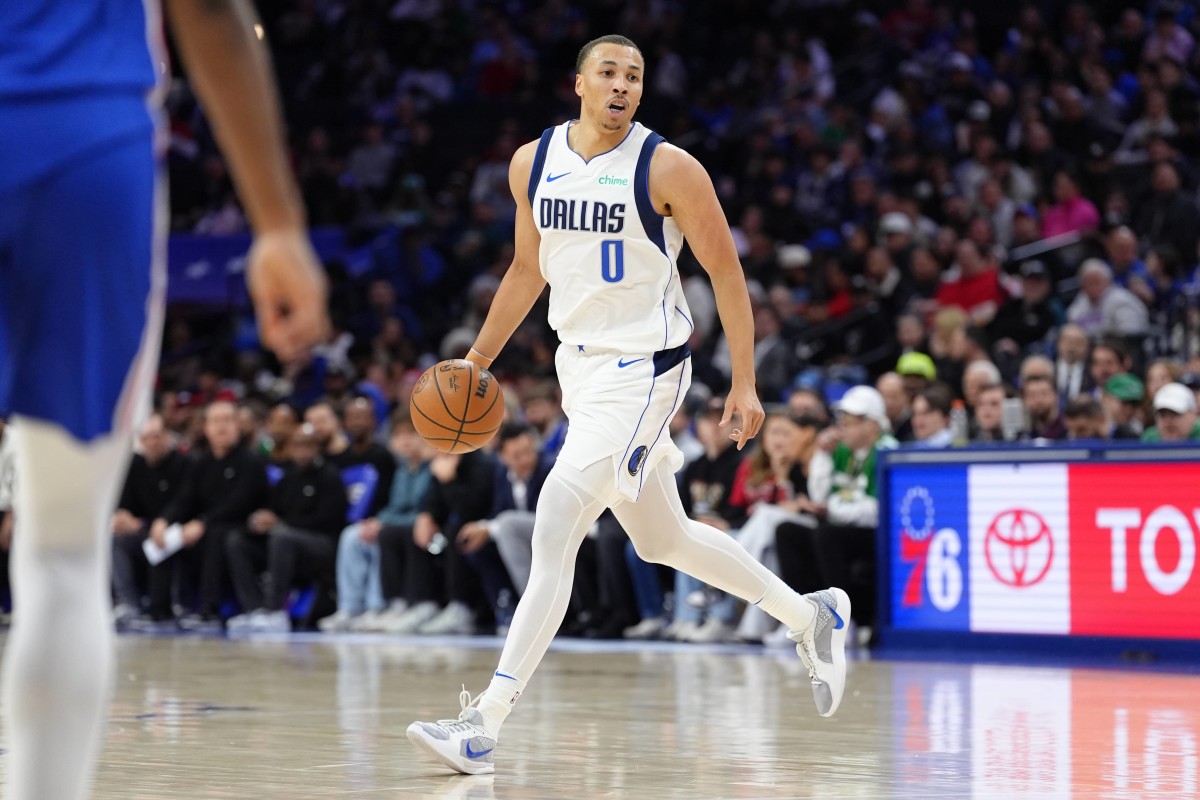 Philadelphia, Pennsylvania, USA; Dallas Mavericks guard Dante Exum (0) controls the ball against the Philadelphia 76ers in the second quarter at Wells Fargo Center. Mandatory Credit: Kyle Ross-Imagn Images