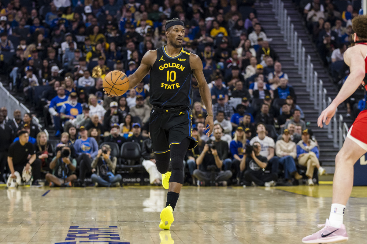 Mar 20, 2025; San Francisco, California, USA; Golden State Warriors forward Jimmy Butler III (10) takes the ball down the court against the Toronto Raptors during the second quarter at Chase Center. Mandatory Credit: John Hefti-Imagn Images  
