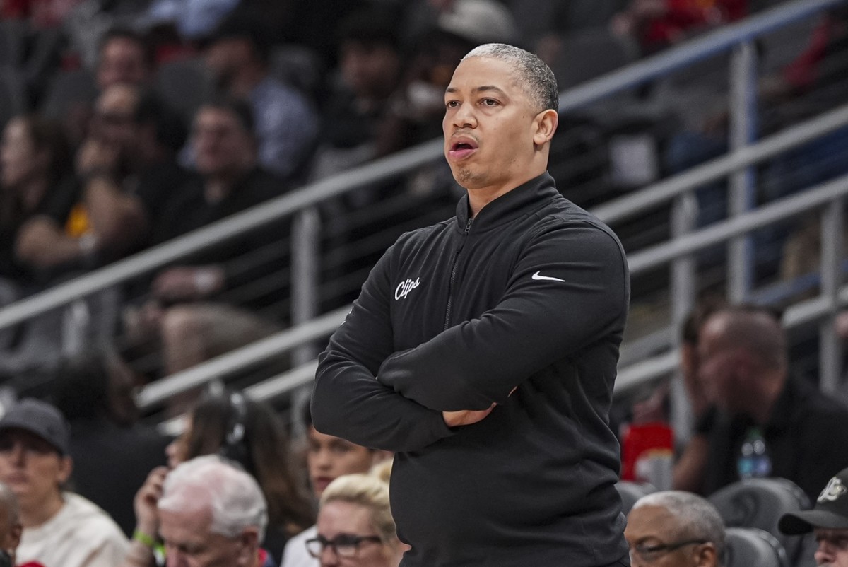 LA Clippers head coach Tyronn Lue works on the sideline against the Atlanta Hawks during the first half at State Farm Arena. Mandatory Credit: Dale Zanine-Imagn Images