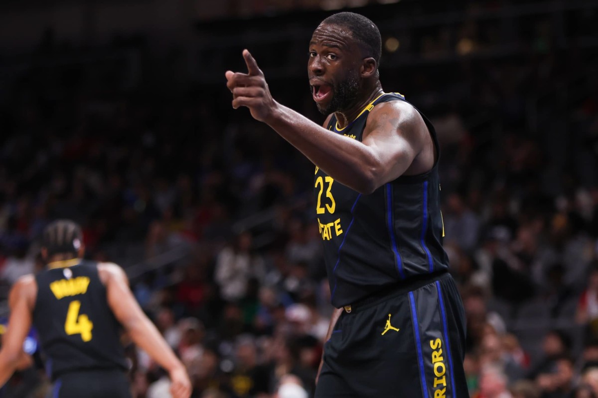 Golden State Warriors forward Draymond Green (23) argues a call against the Atlanta Hawks in the first quarter at State Farm Arena.