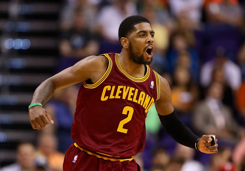PHOENIX, AZ - MARCH 12: Kyrie Irving #2 of the Cleveland Cavaliers celebrates after scoring against the Phoenix Suns during the second half of the NBA game at US Airways Center on March 12, 2014 in Phoenix, Arizona. NOTE TO USER: User expressly acknowledges and agrees that, by downloading and or using this photograph, User is consenting to the terms and conditions of the Getty Images License Agreement. (Photo by Christian Petersen/Getty Images)
