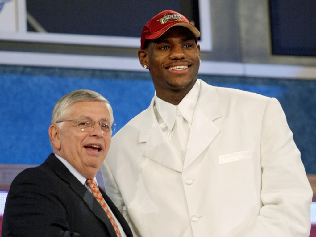 LeBron James poses with late commisioner David Stern on draft night.