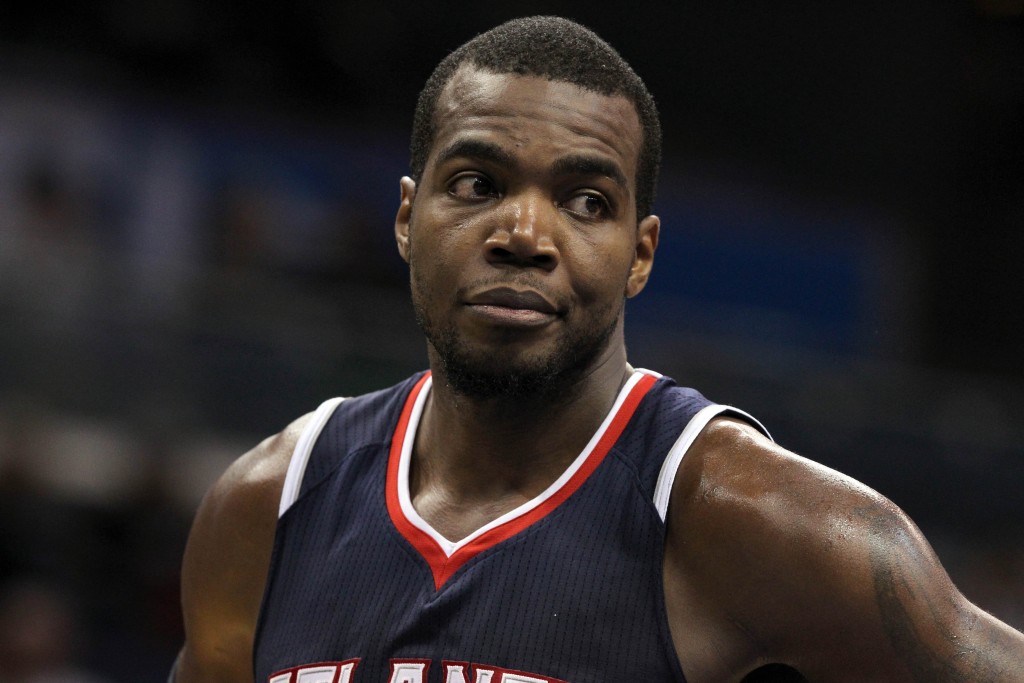 Dec 13, 2014; Orlando, FL, USA; Atlanta Hawks forward Paul Millsap (4) against the Orlando Magic during the second half at Amway Center. Orlando Magic defeated the Atlanta Hawks 100-99. Mandatory Credit: Kim Klement-USA TODAY Sports