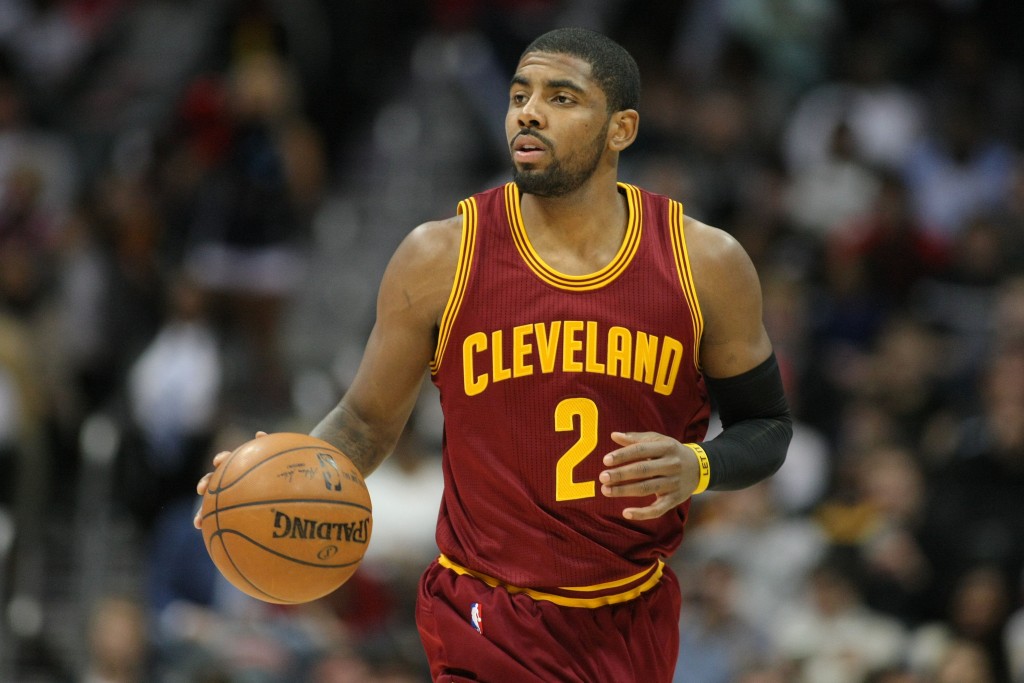 Dec 30, 2014; Atlanta, GA, USA; Cleveland Cavaliers guard Kyrie Irving (2) dribbles the ball against the Atlanta Hawks in the first quarter at Philips Arena. Mandatory Credit: Brett Davis-USA TODAY Sports