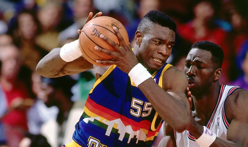 LOS ANGELES - 1991:  Dikembe Mutombo #55 of the Denver Nuggets drives to the basket against the Los Angeles Clippers during an NBA game in 1991 at the Los Angeles Memorial Sports Arena in Los Angeles, California.  NOTE TO USER: User expressly acknowledges and agrees that, by downloading and/or using this Photograph, user is consenting to the terms and conditions of the Getty Images License Agreement.  Mandatory Copyright Notice: Copyright 1991 NBAE (Photo by Jon SooHoo/NBAE via Getty Images) *** Local Caption *** Dikembe Mutombo