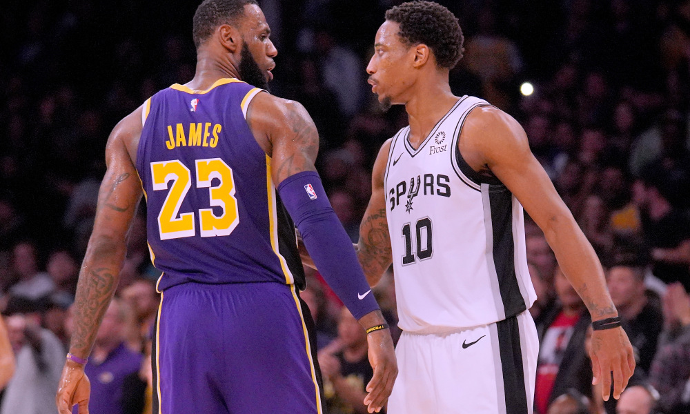 LOS ANGELES, CA - DECEMBER 05:  LeBron James #23 of the Los Angeles Lakers and DeMar DeRozan #10 of the San Antonio Spurs shake hands at the end of the game during a 121-113 Laker win at Staples Center on December 5, 2018 in Los Angeles, California.  NOTE TO USER: User expressly acknowledges and agrees that, by downloading and or using this photograph, User is consenting to the terms and conditions of the Getty Images License Agreement.  (Photo by Harry How/Getty Images)