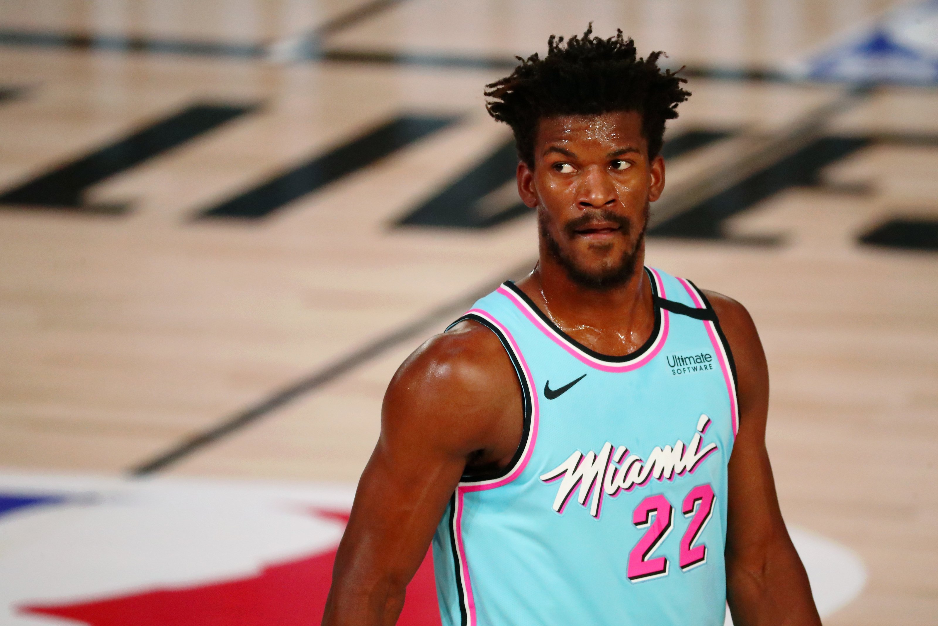 Miami Heat forward Jimmy Butler (22) looks on against the New York Knicks during the second quarter at Kaseya Center.