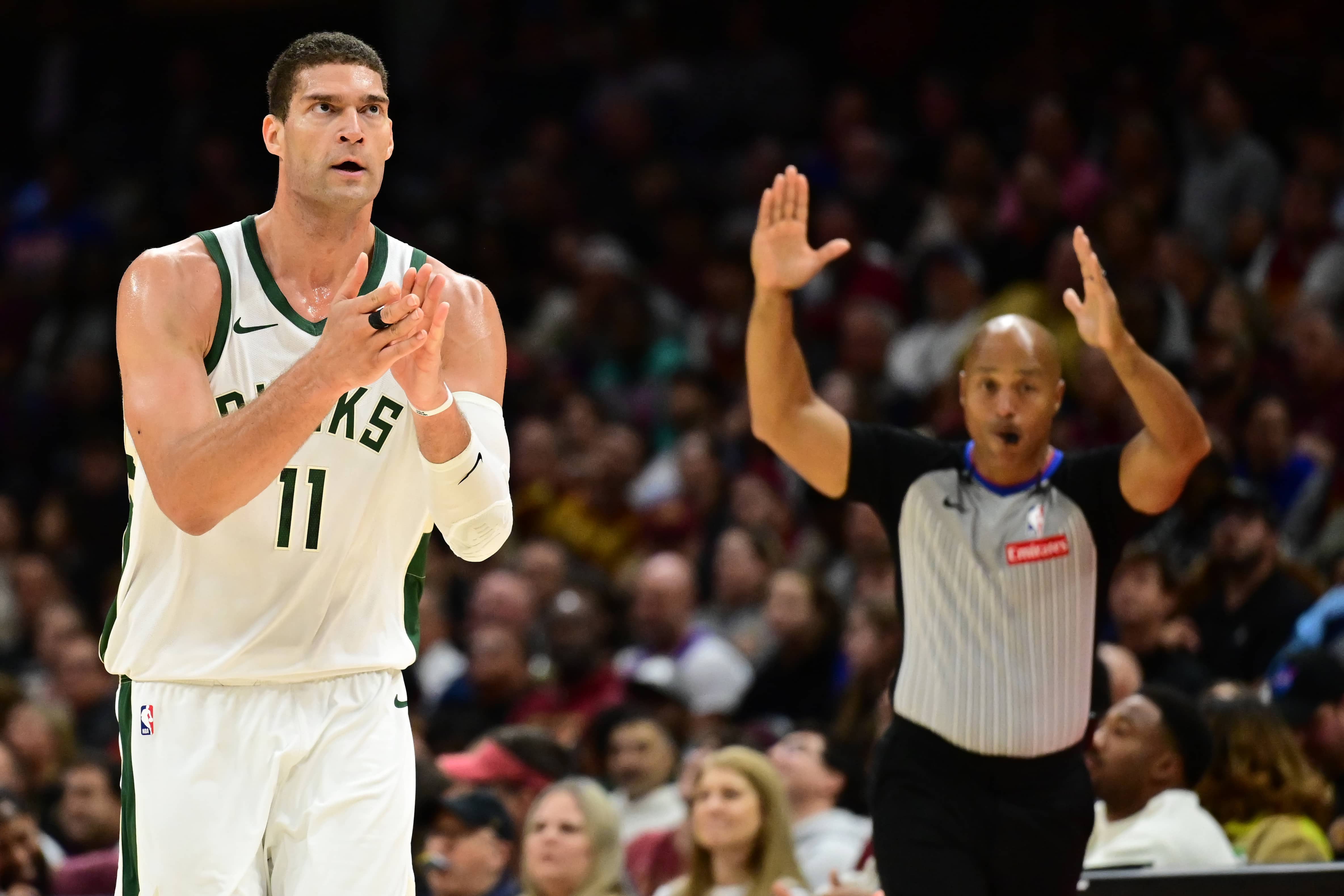 Nov 4, 2024; Cleveland, Ohio, USA; Milwaukee Bucks center Brook Lopez (11) celebrates after hitting a three point basket during the second half against the Cleveland Cavaliers at Rocket Mortgage FieldHouse.