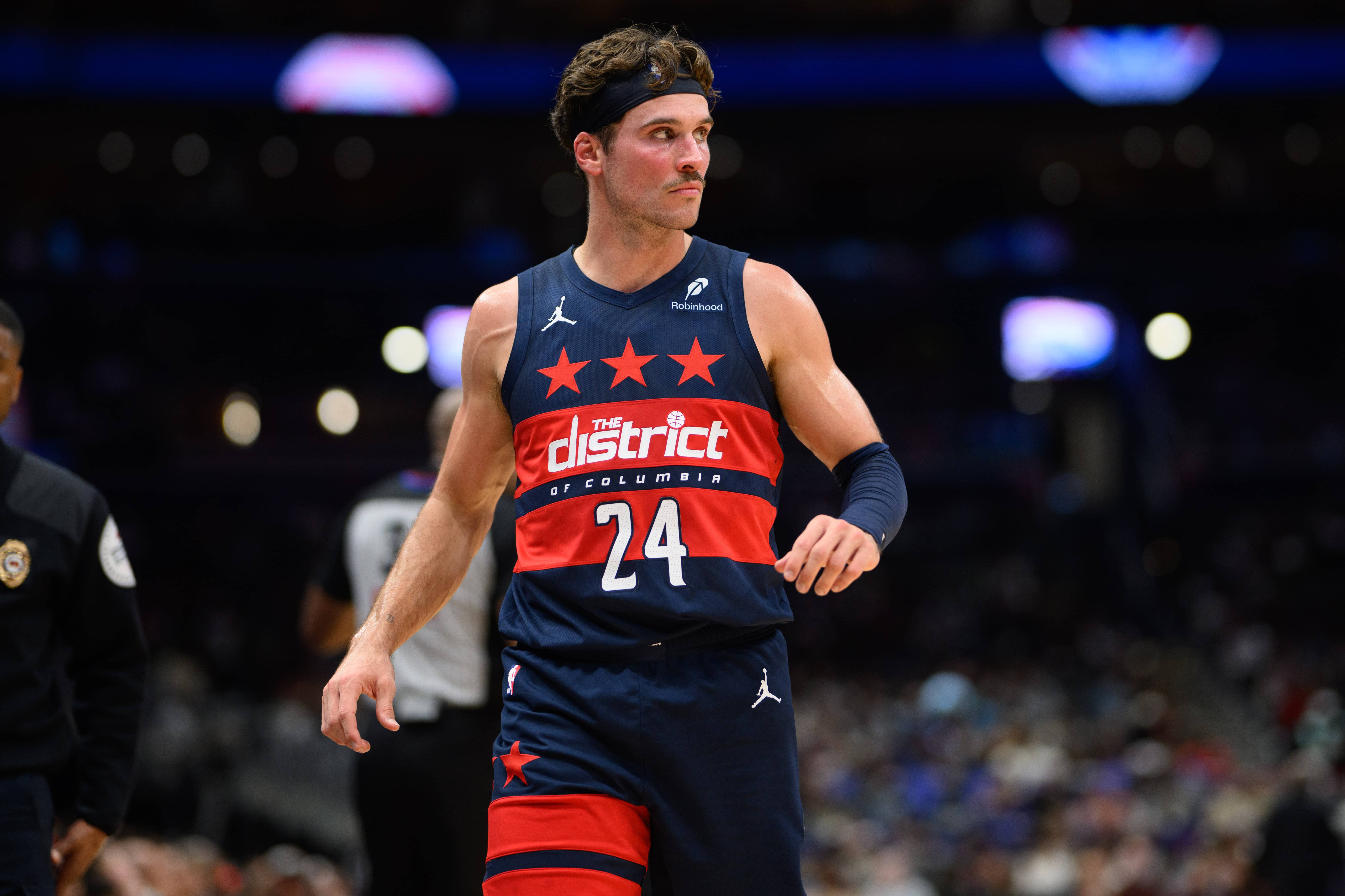Oct 26, 2024; Washington, District of Columbia, USA; Washington Wizards forward Corey Kispert (24) looks on from the sideline during the second quarter against the Cleveland Cavaliers at Capital One Arena.