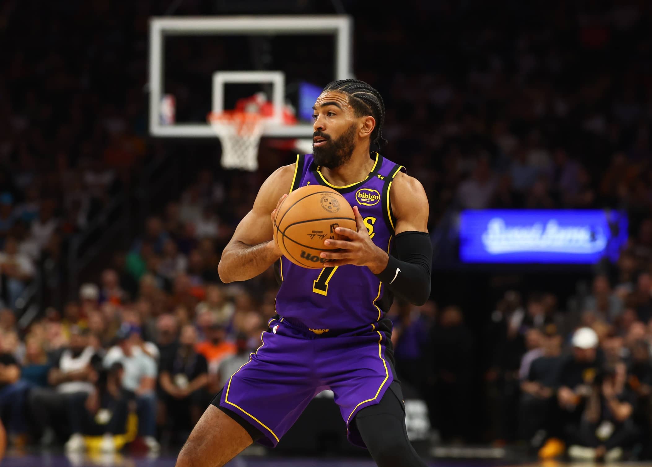 Oct 28, 2024; Phoenix, Arizona, USA; Los Angeles Lakers guard Gabe Vincent (7) against the Phoenix Suns at Footprint Center.